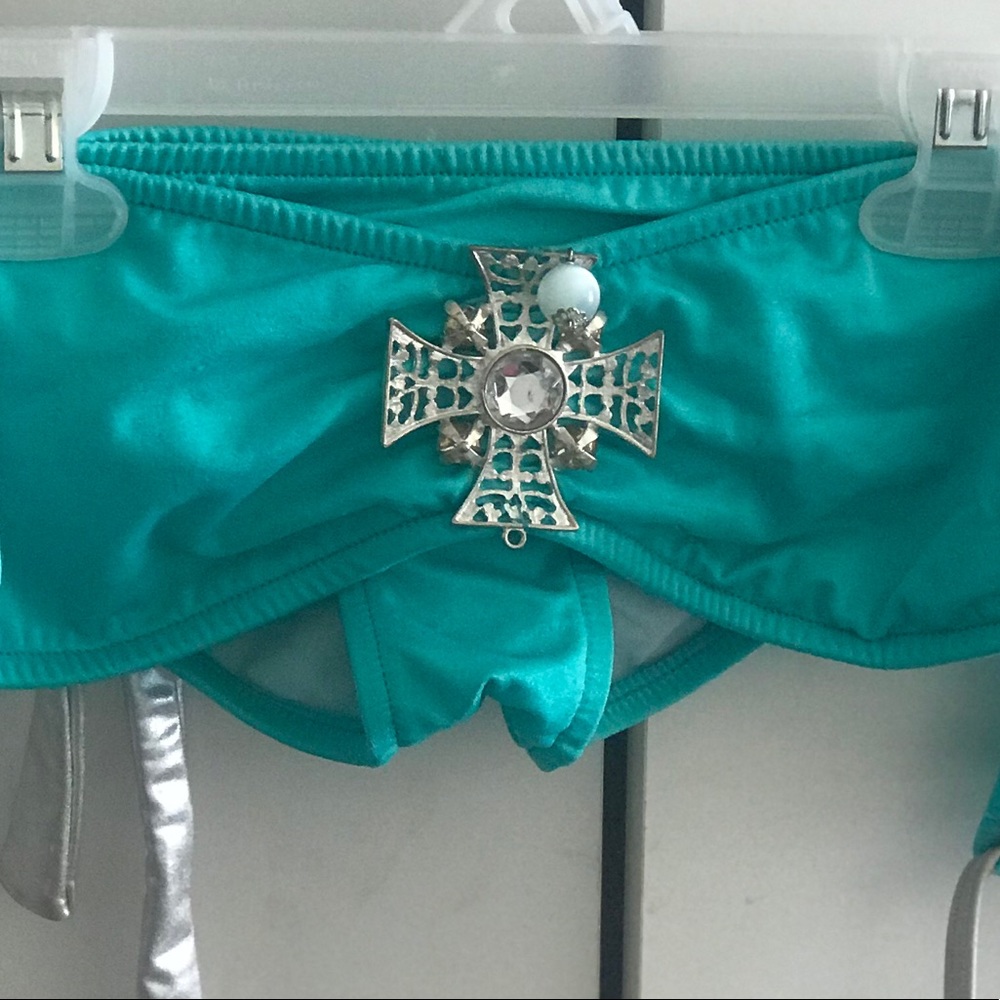 New teal and silver bikini w accent jewelry on top